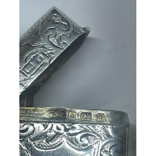 523 - A DECORATIVE HALLMARKED BIRMINGHAM SILVER VESTA CASE