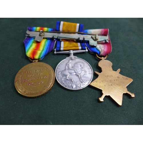 387 - A WORLD WAR I MEDAL TRIO AWARDED TO 1707 CORPORAL W H WHITWORTH WEST RIDING REGIMENT