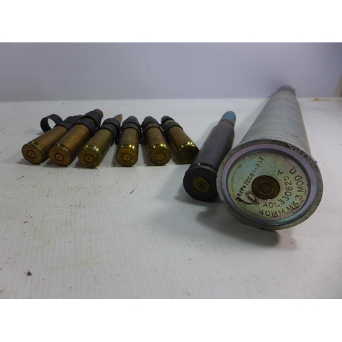 396 - A 40MM PRACTICE SHELL, INERT SHELL AND MACHINE GUN CASINGS HEIGHTS FROM 10 TO 45CM