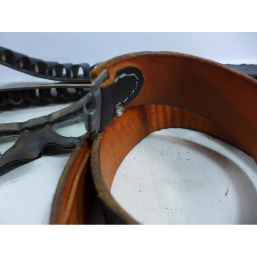 410 - A LEATHER CARTRIDGE BELT, TWO LEATHER BELTS AND A PAIR OF FLYING GOGGLES