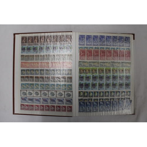 409 - TWO FULL ALBUMS CONTAINING BRITISH AND FOREIGN STAMPS