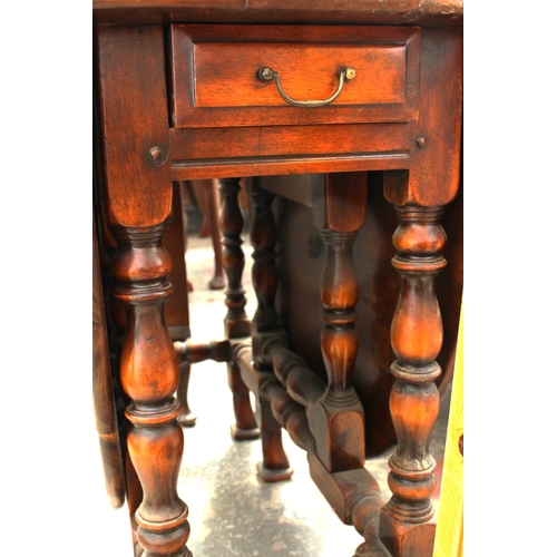 2695 - A GEORGE III STYLE OVAL GATE-LEG TABLE ON TURNED LEGS WITH SCROLL FEET AND TWO END DRAWERS, 57