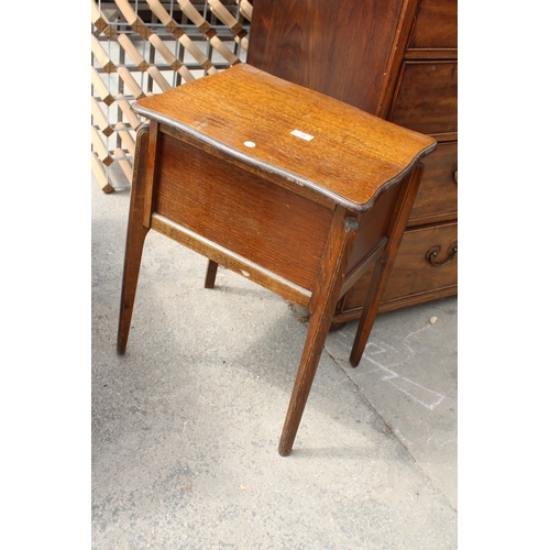 2706 - AN OAK MORCO PRODUCT SEWING BOX/TABLE