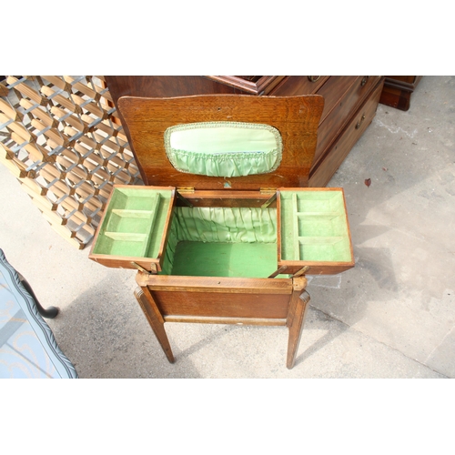 2706 - AN OAK MORCO PRODUCT SEWING BOX/TABLE