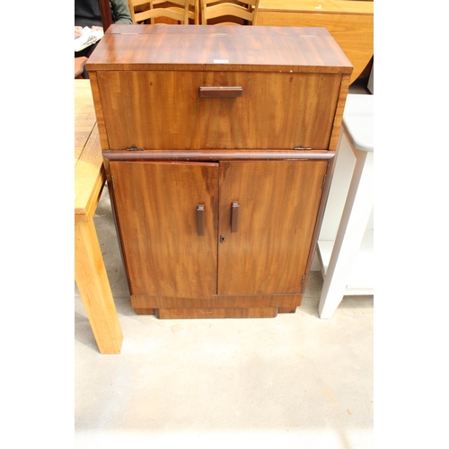 2719 - A MID 20TH CENTURY MAHOGANY COCKTAIL CABINET WITH DROP-DOWN FRONT AND MIRRORED MIXING AREA, 27.5