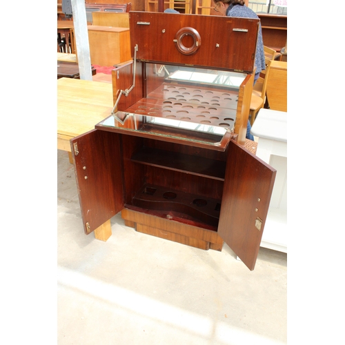 2719 - A MID 20TH CENTURY MAHOGANY COCKTAIL CABINET WITH DROP-DOWN FRONT AND MIRRORED MIXING AREA, 27.5