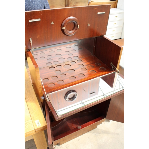 2719 - A MID 20TH CENTURY MAHOGANY COCKTAIL CABINET WITH DROP-DOWN FRONT AND MIRRORED MIXING AREA, 27.5