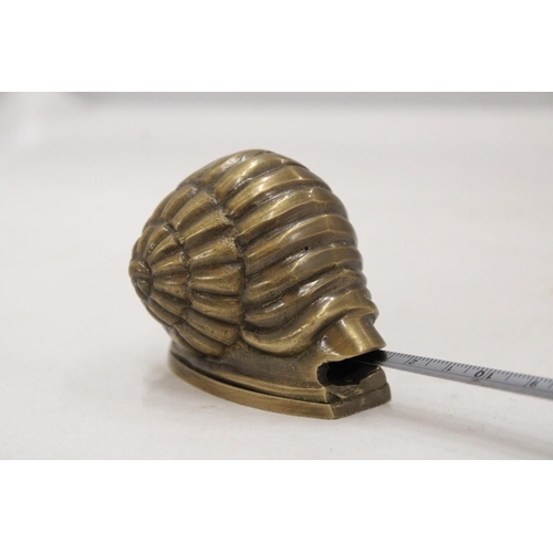 208 - A BRASS SNAIL TAPE MEASURE