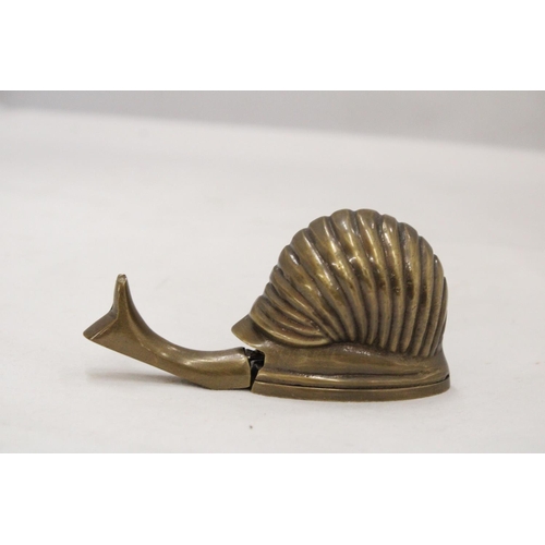 208 - A BRASS SNAIL TAPE MEASURE