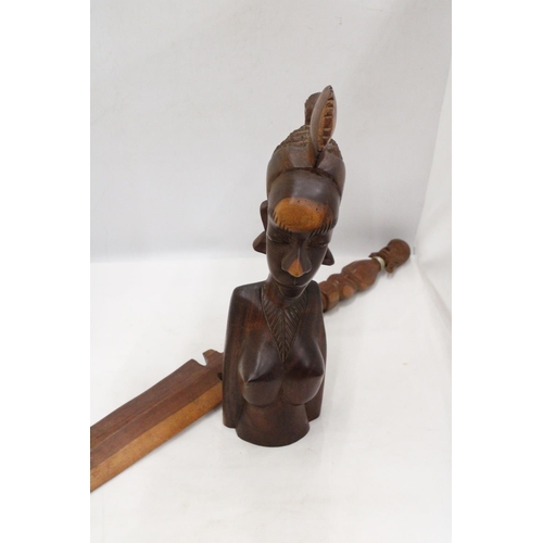 212 - AN AFRICAN CARVED WOODEN SCULPTURE OF A WOMAN'S HEAD PLUS A WOODEN AFRICAN STICK