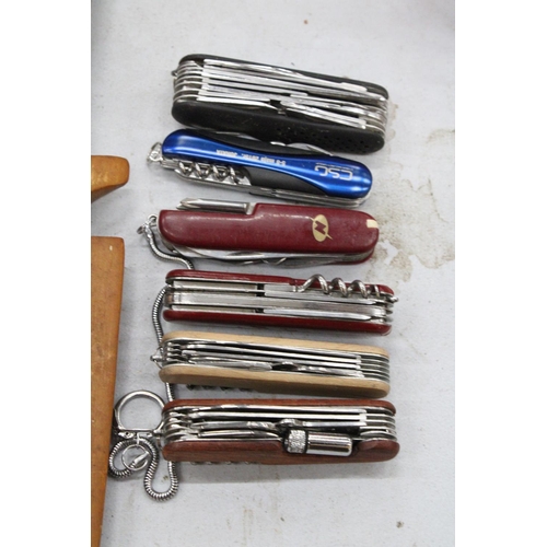 214 - FIVE VINTAGE MULTI-TOOL PENKNIVES AND ONE OTHER