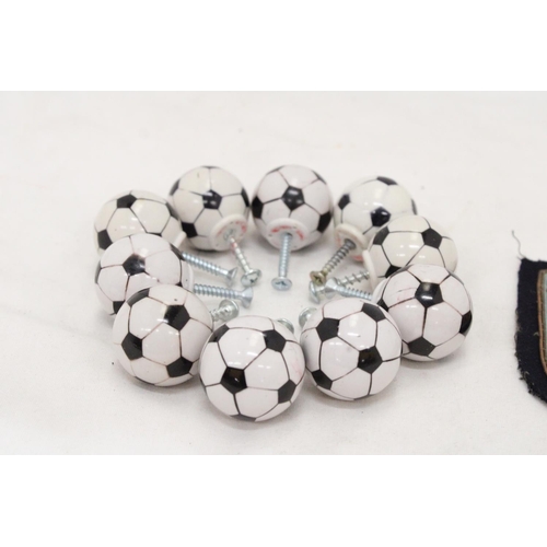 233 - A 1930'S EMBROIDED BADGE PLUS TEN FIFA FOOTBALL DRAWER KNOBS