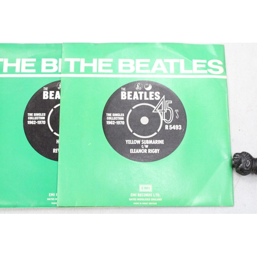 242 - THREE BEATLES SINGLES TO INCLUDE HEY JUDE, YESTERDAY AND ELEANOR RIGBY