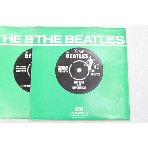 242 - THREE BEATLES SINGLES TO INCLUDE HEY JUDE, YESTERDAY AND ELEANOR RIGBY