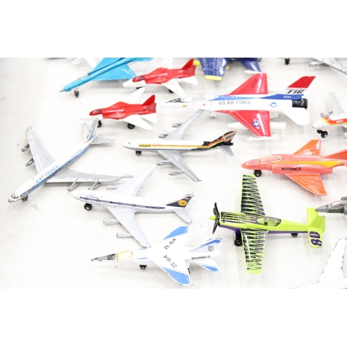 243 - A LARGE LOT OF DIECAST AEROPLANES AND MATCHBOX