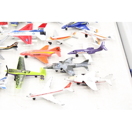 243 - A LARGE LOT OF DIECAST AEROPLANES AND MATCHBOX