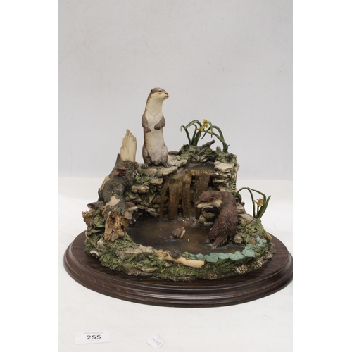 255 - A LARGE OTTER PARADISE ORNAMENT ON PLINTH PLUS PLUS PAST TIMES FAIRY