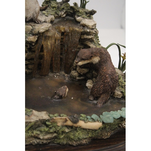 255 - A LARGE OTTER PARADISE ORNAMENT ON PLINTH PLUS PLUS PAST TIMES FAIRY