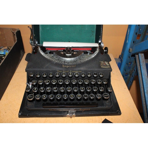 287 - A VINTAGE IMPERIAL TYPEWRITER IN CASE