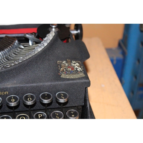 287 - A VINTAGE IMPERIAL TYPEWRITER IN CASE