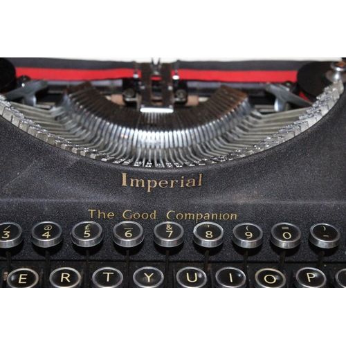 287 - A VINTAGE IMPERIAL TYPEWRITER IN CASE