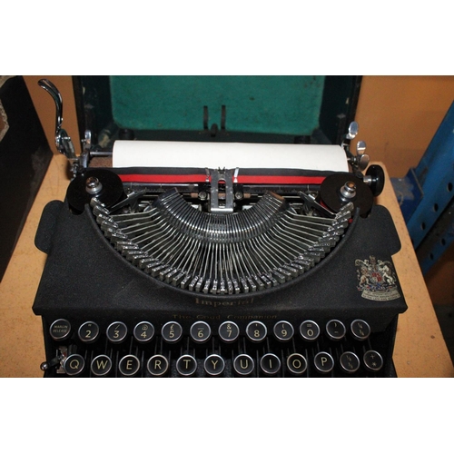 287 - A VINTAGE IMPERIAL TYPEWRITER IN CASE