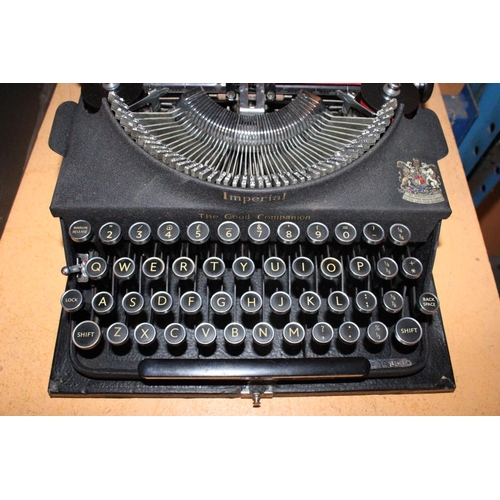 287 - A VINTAGE IMPERIAL TYPEWRITER IN CASE