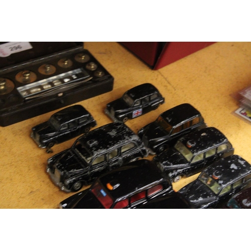 297 - THIRTEEN DIE-CAST MODEL LONDON TAXI CABS BY CORGI AND MATCHBOX