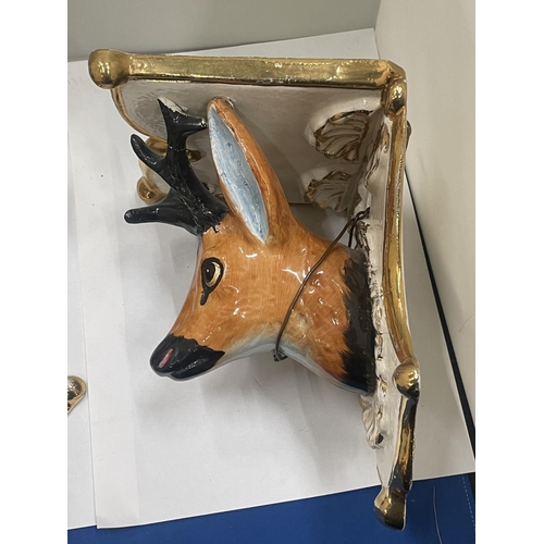21 - A PAIR OF STAG WALL SCONCES