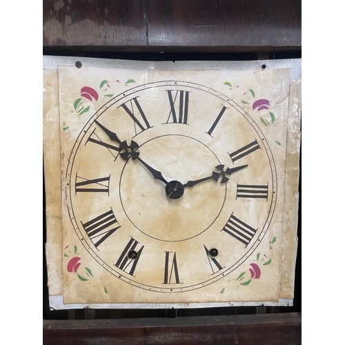 38 - AN ANSONIA CLOCK CO. DECORATIVE WALL CLOCK WITH A DECORATIVE FACE AND TWO GLASS DOORS ONE WITH PAINT... 