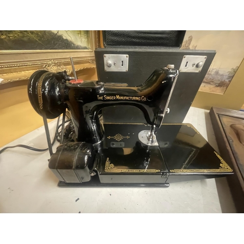 54 - A SINGER PORTABLE ELECTRIC SEWING MACHINE NO. 221K1 IN ORIGINAL BOX WITH PEDAL, INSTRUCTIONS, SPOOLS... 