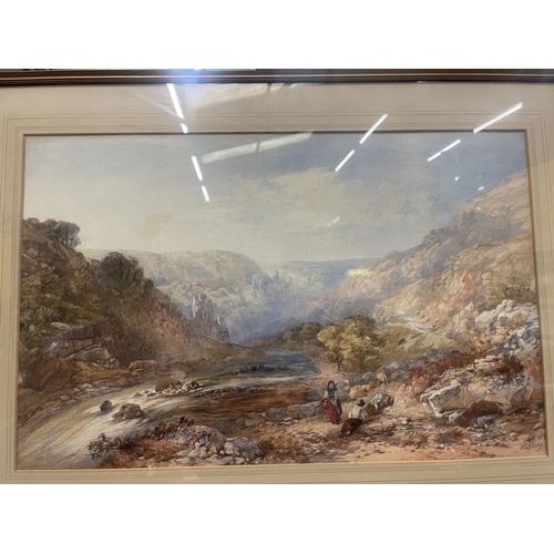 59 - A FRAMED WATERCOLOUR OF A MOUNTAINOUS RIVER SCENE WITH A SHEPHERD AND SHEPHERDESS WITH SHEEP SIGNED ... 