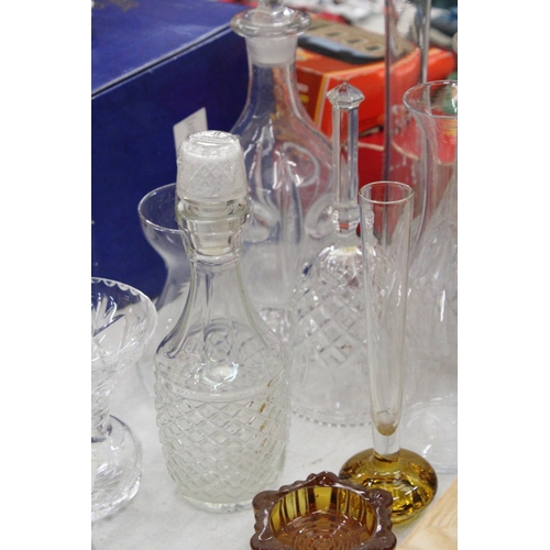 166 - A QUANTITY OF GLASSWARE TO INCLUDE, DECANTERS, BOWLS, VASES, BELLS, ETC