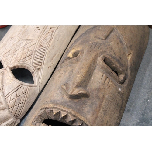 890 - TWO HANDCARVED TRIBAL MASKS