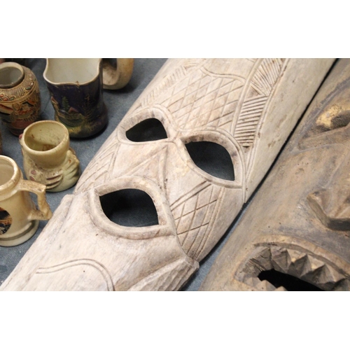 890 - TWO HANDCARVED TRIBAL MASKS