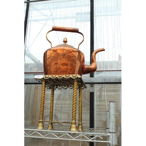 1571 - A VINATGE COPPER KETTLE AND A BRASS TRIVET STAND