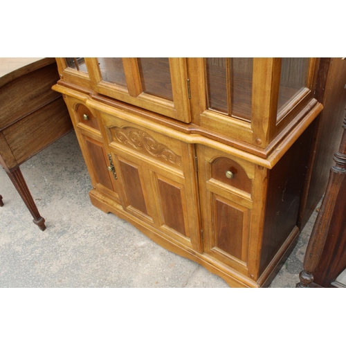 A Modern Hardwood Bookcase On Base, 55