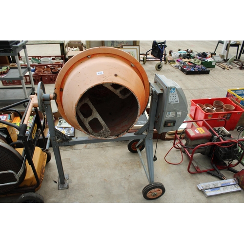 A BUILD BUDDY ROLL OVER CEMENT MIXER