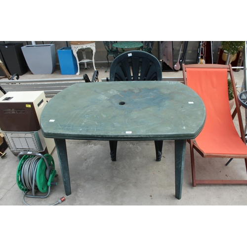 1763 - A PLASTIC GARDEN TABLE AND THREE PLASTIC STACKIBNG CHAIRS