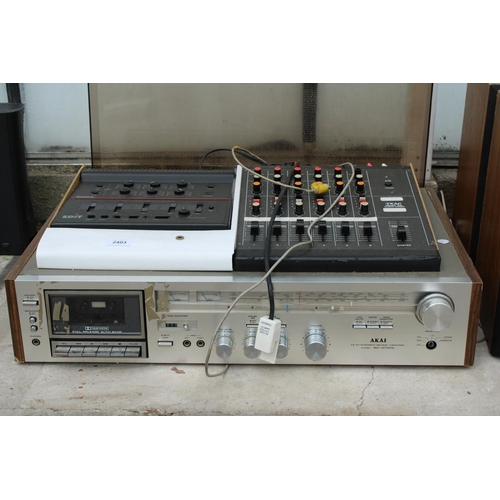 2403 - AN AKAI STEREO SYSTEM WITH MODEL 2A AUDIO MIXER AND A PAIR OF WOODEN CASED SOLAVOX SPEAKERS ETC