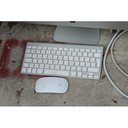 2404 - AN APPLE MAC COMPUTER WITH KEYBOARD AND MOUSE
