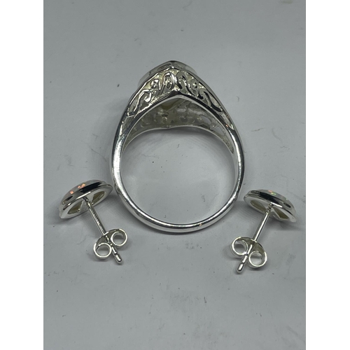 508 - A SILVER RING WITH LARGE OPAL SIZE R/S AND A PAIR OF MATCHING EARRINGS