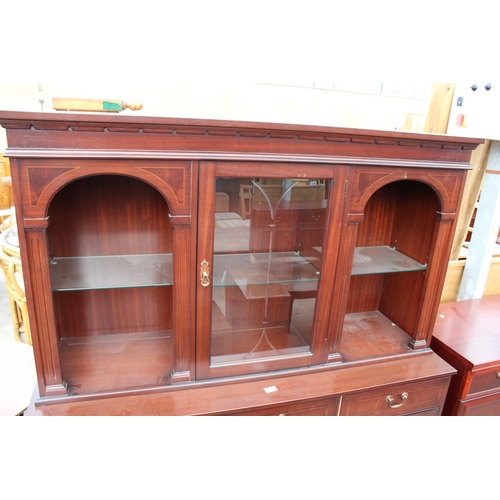 2867 - A MODERN MAHOGANY EFFECT CROSSBANDED STRONGBOW CABINET ON BASE, 55