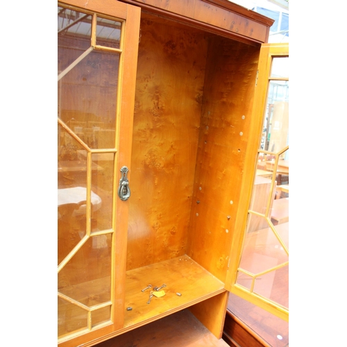 2869 - A YEW WOOD ASTRAGAL GLAZED TWO DOOR BOOKCASE ON BASE, 36