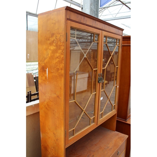 2869 - A YEW WOOD ASTRAGAL GLAZED TWO DOOR BOOKCASE ON BASE, 36