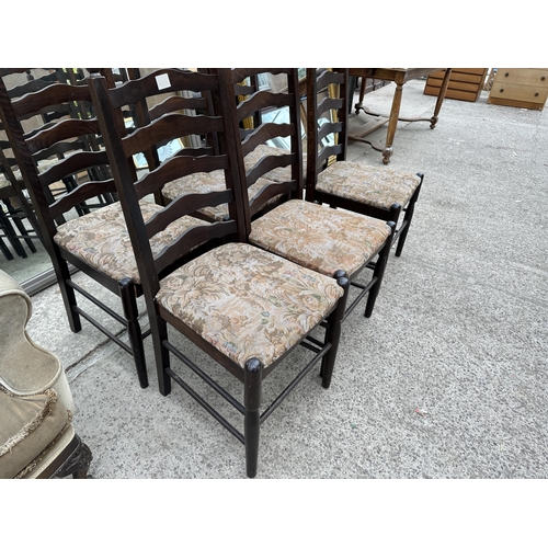 2875 - A SET OF SIX OAK LADDER BACK DINING CHAIRS