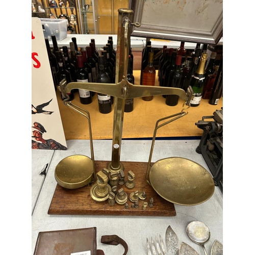 34A - A SET OF W.T. AVERY LTD BIRMINGHAM BRASS SCALES AND WEIGHTS