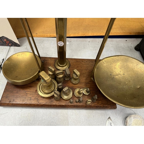 34A - A SET OF W.T. AVERY LTD BIRMINGHAM BRASS SCALES AND WEIGHTS