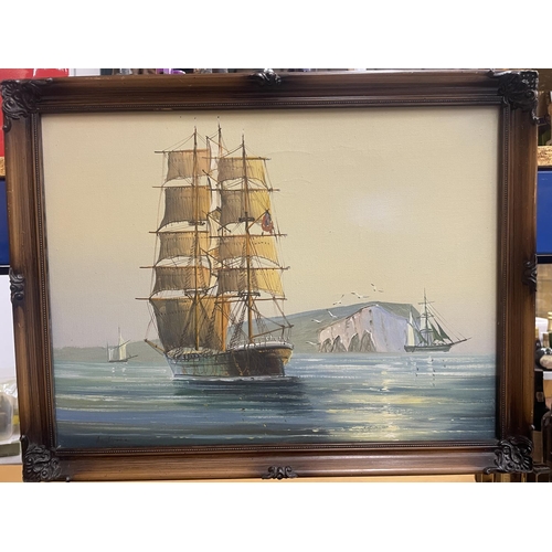 46 - A GILT FRAMED OIL ON CANVAS OF A GALLEON SIGNED TO THE LOWER LEFT HAND CORNER 30CM X 40CM