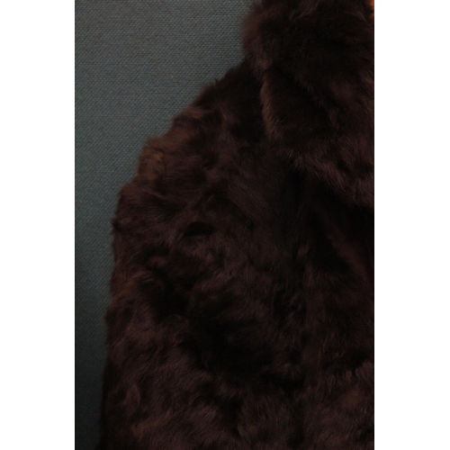 87 - A BROWN FUR COAT